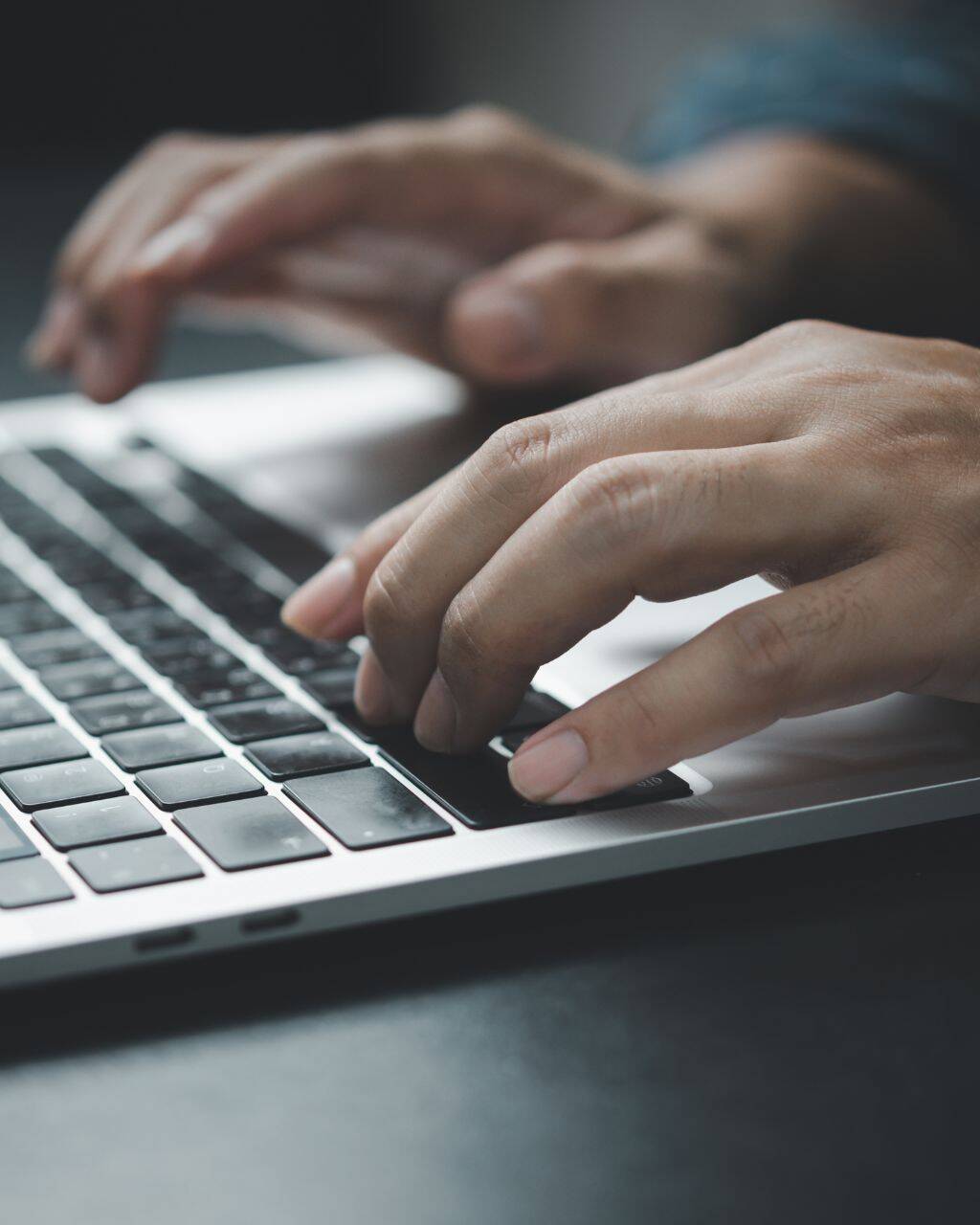 hands-typing-on-a-laptop