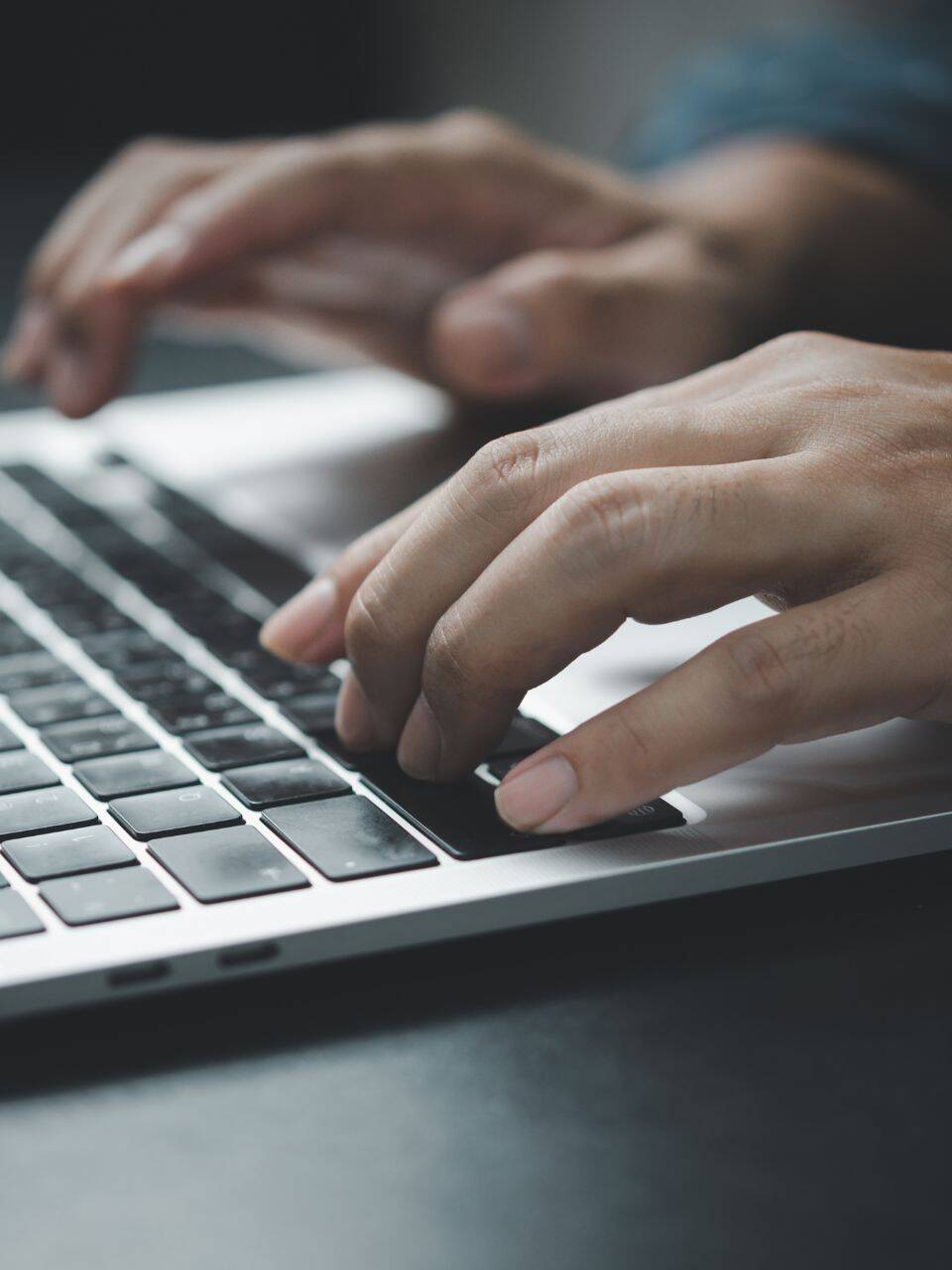 hands-typing-on-a-laptop